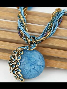 Braided Turquoise and Gold Pendant Necklace -